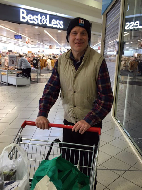 Image of a man with a shopping trolley